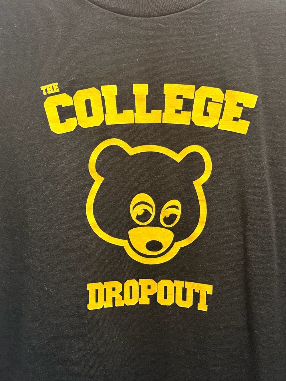 The College Dropout Black Graphic Tee with Yellow Bear Logo